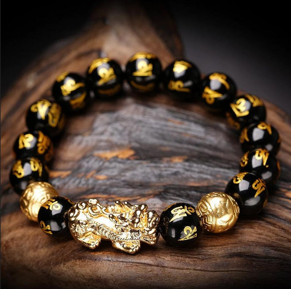 Bracelet en perles avec un Pixiu, animal mythologique chinois