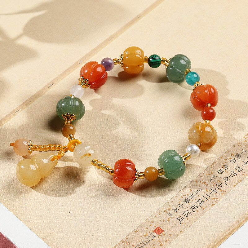 Bracelet Feng Shui artisanal en pierre jade, associé à la santé et la sérénité intérieure.
