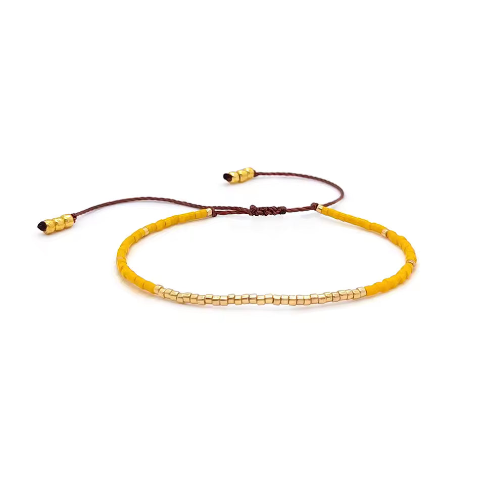 Bracelet corail Miyuki aux couleurs douces et modernes.