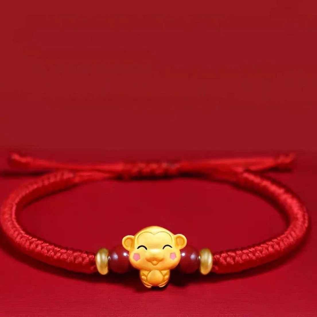 Bracelet signe Singe avec animal doré central. Un bijou mixte à choisir selon son signe ou son animal préféré.